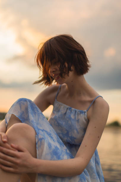 istock Fashion model at sunset background. Summer evening 2153738268