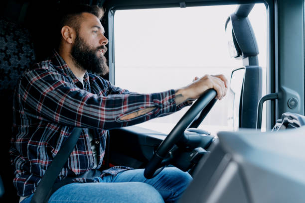 istock Professional truck driver at the wheel 2153739064