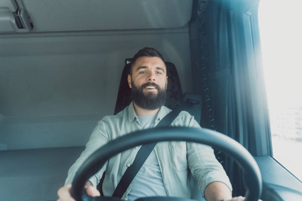 istock Smiling man driving a large vehicle 2153739137