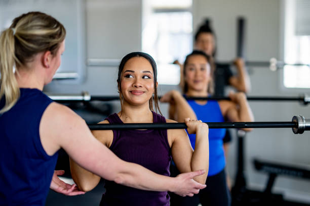 istock Women Weight Lifting 2153741416