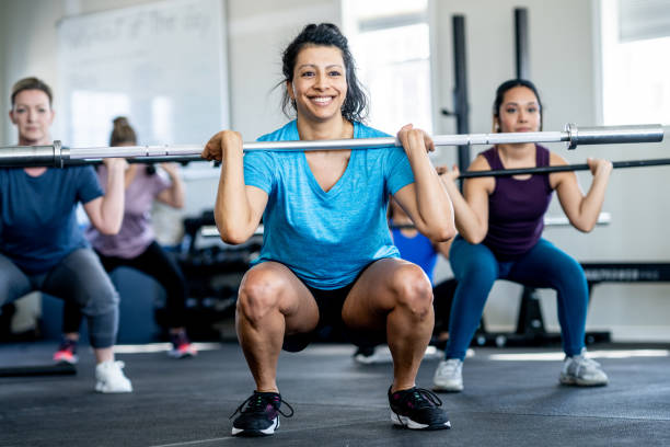 istock Women Weight Lifting 2153741471