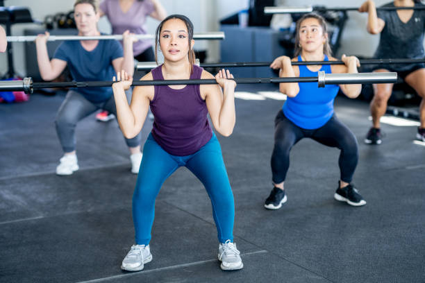istock Women Weight Lifting 2153741487