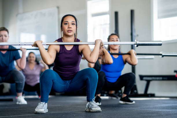 istock Women Weight Lifting 2153741505