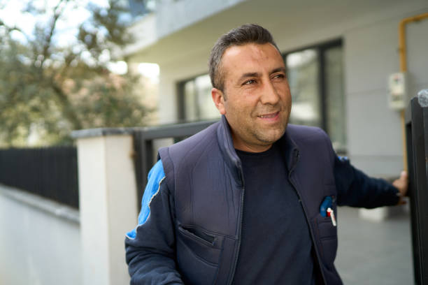 The relaxation and smile of the courier who has finished his shift