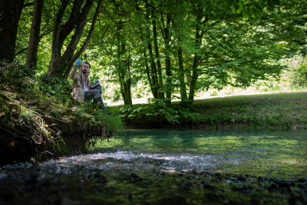 istock An environmentalist researcher collects water samples in a river 2153745118