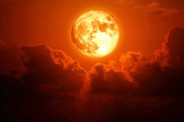 istock full milk blood moon rise back blur dark cloud on the night sky 2153747742