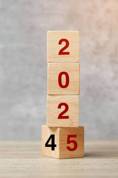 istock block flipping 2024  to 2025 text on table. Resolution, strategy, plan, goal, motivation, reboot, business and New Year holiday concepts 2153754075