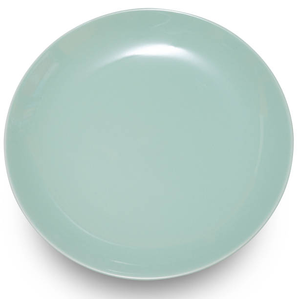 istock Green circle ceramics plate isolated on white background. 2153755020