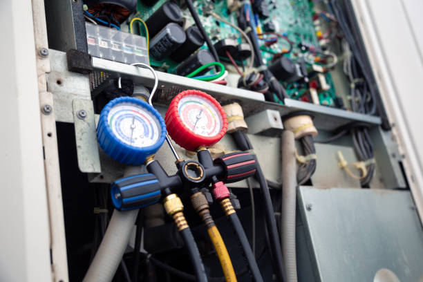 istock Air conditioning service,HVAC Using a gauge to check the refrigerant in the system. Concept of inspection and maintenance services 2153758499