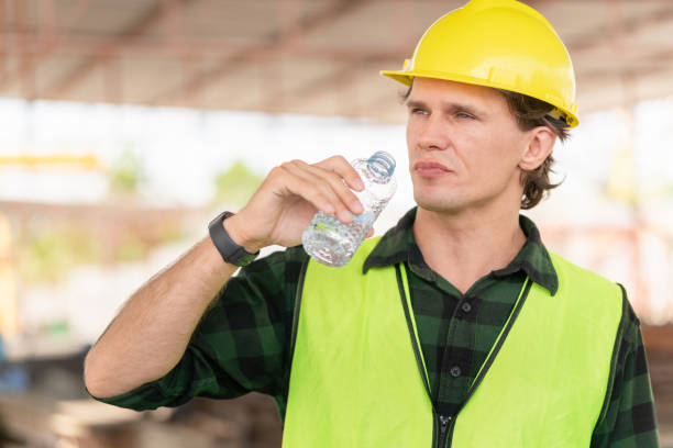 istock Caucasian engineer man drinking water at the precast factory site, Worker man drinking water at construction site 2153758730
