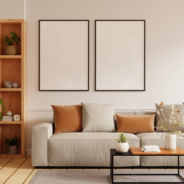 istock Mockup poster frame on the wall of living room with sofa and table on empty white wall background- 3D rendering 2153760326