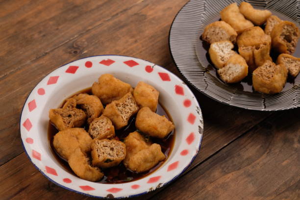 istock Tahu gejrot is a typical food from Cirebon, West Java, Indonesia, made from tofu that has been fried and then eaten with a sauce consisting of chili, garlic, shallots and sugar. Indonesian food 2153761512