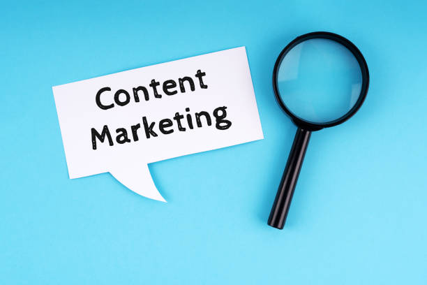 istock Paper note with text content marketing and magnifying glass 2153764644