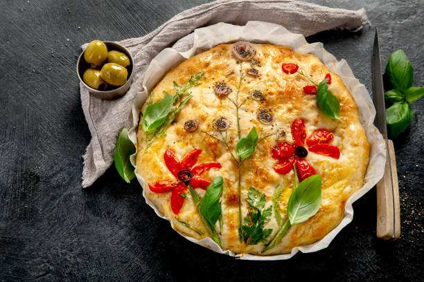 istock Focaccia art. Italian bread on dark background 2153765978