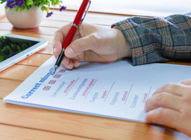 istock English misspelling worksheet with pen and tablet 2153766478