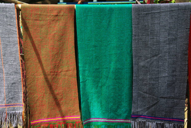 istock Clothes hanging to dry in the sun on texture and background. 2153767040