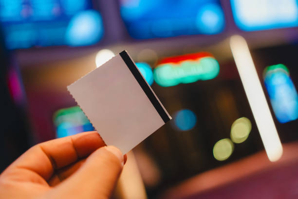 istock An unrecognizable person holding up a movie ticket. 2153768965