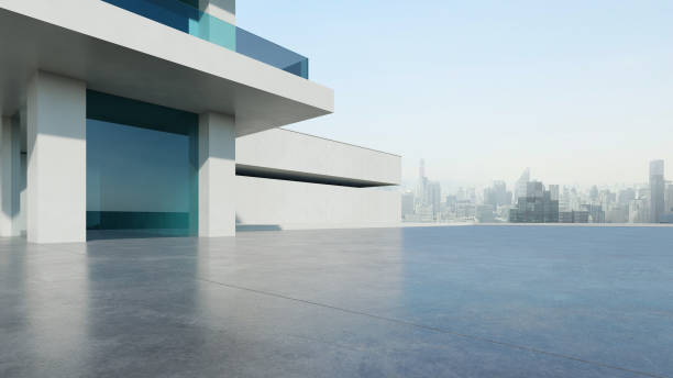 istock 3d render of abstract modern architecture with empty concrete floor and city skyline background, car presentation background. 2153770099