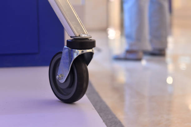 istock close up shopping cart wheel 2153770514
