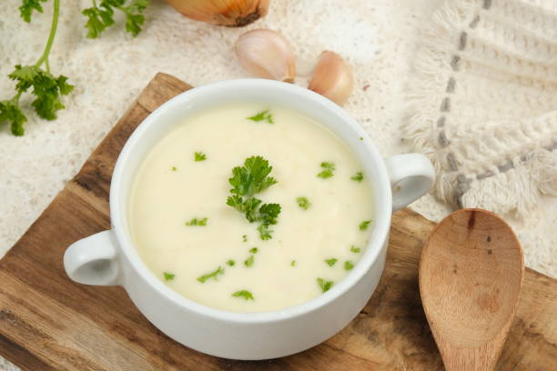 istock Bowl of cream soup on white table 2153771733