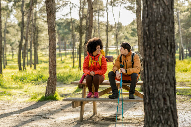 istock Couple Resting on Bench During Forest Hike 2153771745