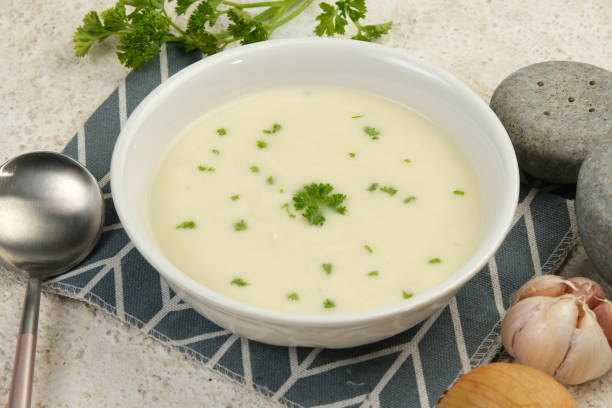 istock Bowl of cream soup on white table 2153772883