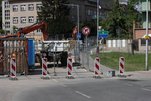 istock City street reconstruction location with excavators 2153773117