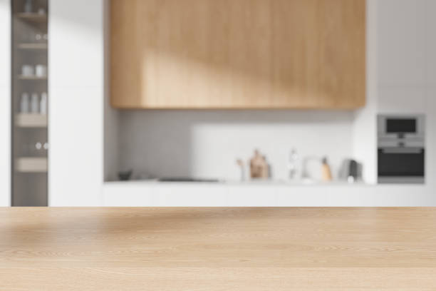 istock Wooden mock up table on background of kitchen interior with kitchenware 2153774212