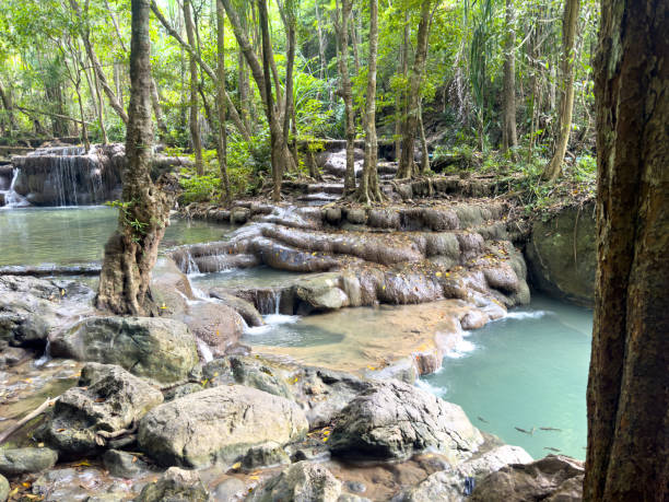 istock Waterfall on a river in the tropical forest of Thailand 2153774314