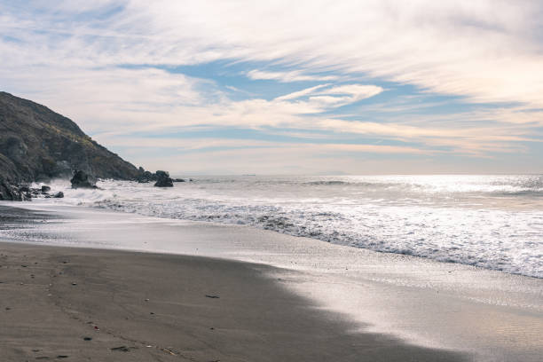 istock Ocean beach with a blue sky on the background 2153775768