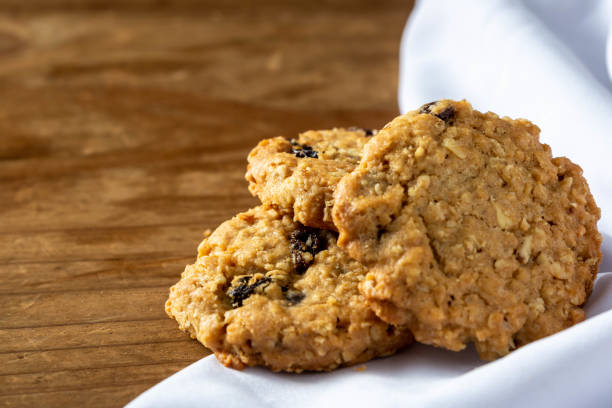istock nut and raisin cookie on wooden background 2153775771