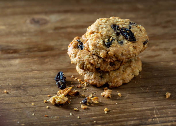 nut and raisin cookie on wooden background