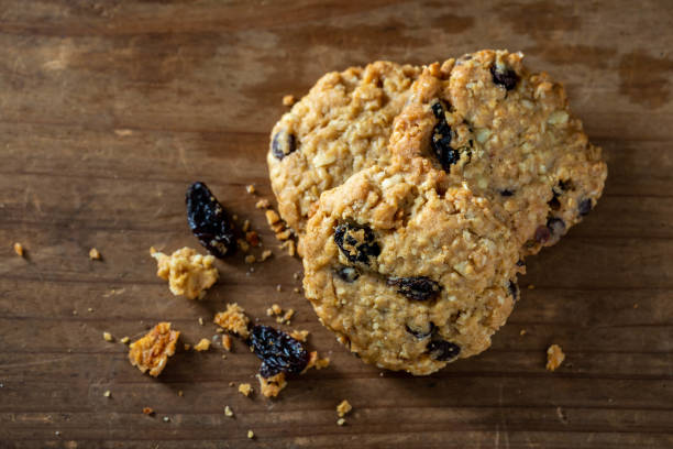 istock nut and raisin cookie on wooden background 2153775780