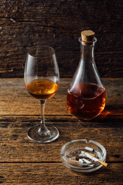 istock whiskey and ashtray on wooden background 2153775850