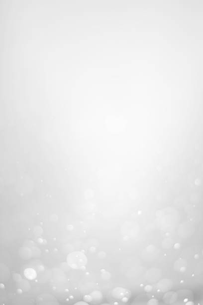 istock White glitter vintage lights background. 2153777740