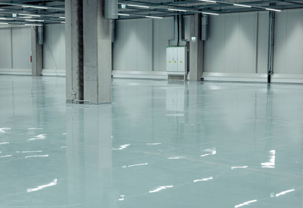 High-gloss epoxy finishes in a warehouse floor, Self leveling epoxy floor High-gloss epoxy finishes in a warehouse floor, Self leveling epoxy floor epoxy floor coating stock pictures, royalty-free photos & images