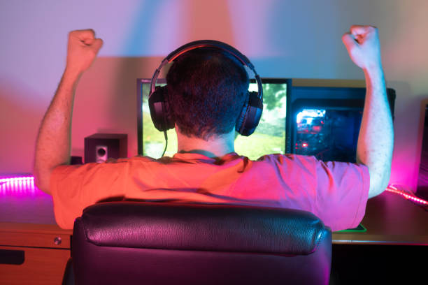 istock A gamer celebrating a big win with an enthusiastic pose 2153781959