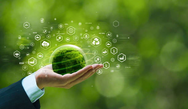 istock Businessman's hand holds green planet with ESG, net zero, carbon co2 and net zero icons. environmentally friendly carbon saves our planet, world environment day, earth day and climate change 2153783703