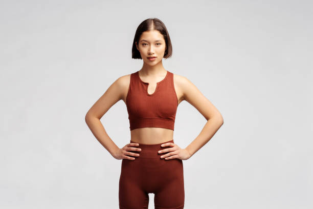 istock Strong active muscular build athletic young woman looking at camera, posing 2153784921