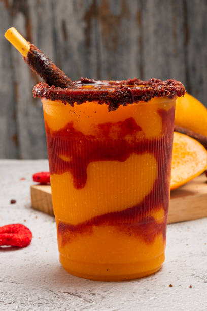 istock Mangonada, typical mexican mango smoothie with chamoy sauce and lime juice. 2153786216