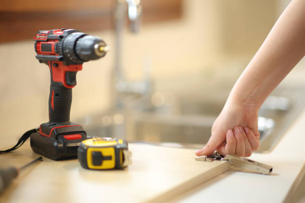 istock Woman hand assembling kitchen furniture 2153786671