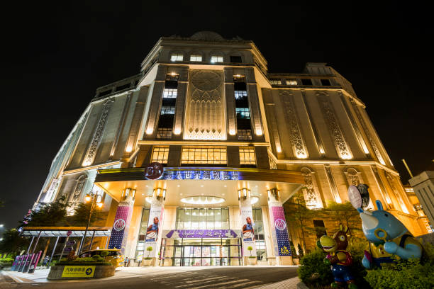 Kaohsiung, Taiwan- May 16, 2024: Night view of the E-DA Outlet Mall at the E-DA Theme Park in Dashu, Kaohsiung, Taiwan.