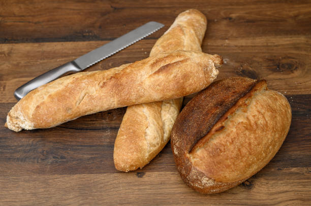 istock Fresh homemade bread in the kitchen on the table waiting for breakfast 2153802567