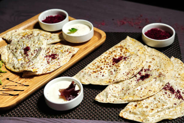 istock Wooden Tray With Quesadillas and Sauces 2153802852
