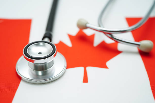 istock Stethoscope on Canada flag background, Business and finance concept. 2153804409