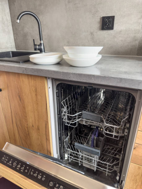 istock Clean plates and glasses inside in a modern dishwasher machine. Household chores 2153807632