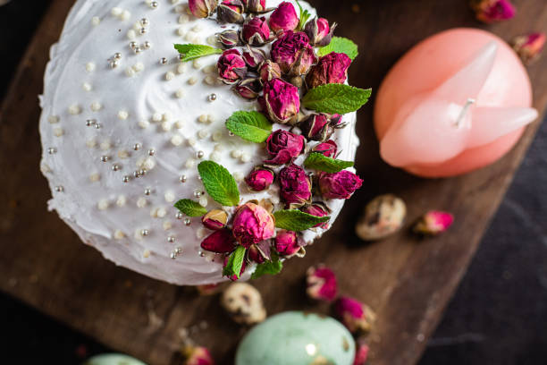 istock Easter cake with Swiss meringue and flowers. Easter eggs 2153807707