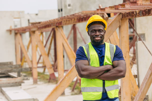 istock Portrait happy smiling African black smart engineer worker foreman supervisor working outdoor in Precast concrete casting industry 2153810040