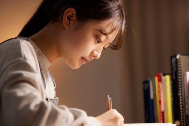 istock A high school girl studying for an exam in her room 2153813206