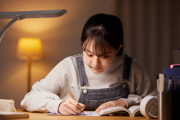 istock A high school girl studying for an exam in her room 2153813216